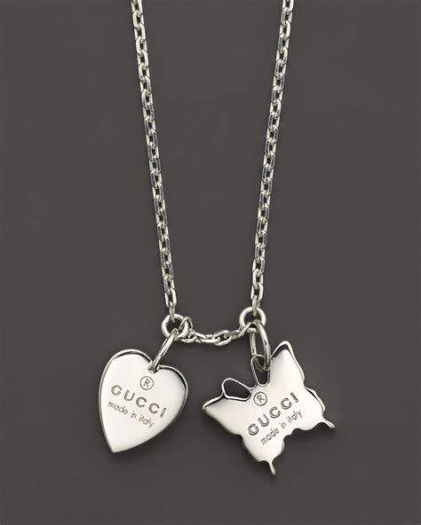 gucci trademark silver butterfly and heart necklace|gucci love heart necklace.